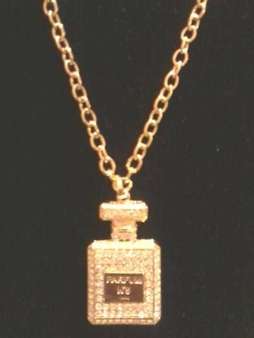 chanel no 5 charm necklace|chanel no 5 bottle necklace.